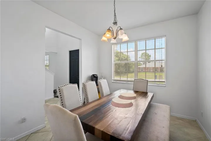 Dining room featuring a notable chandelier