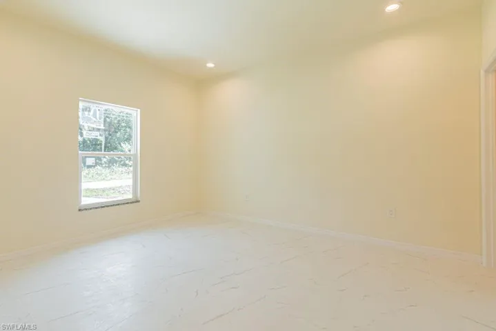 View of tiled spare room