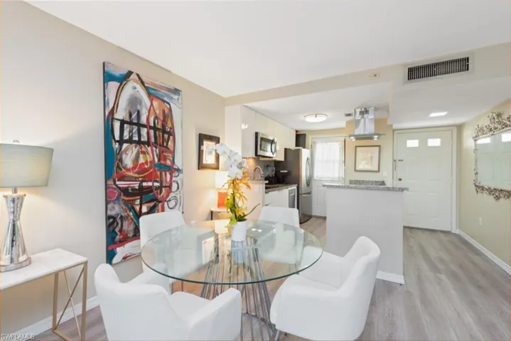 Dining room featuring light hardwood / wood-style floors and sink