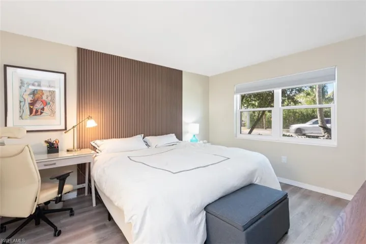 Bedroom featuring dark hardwood / wood-style floors