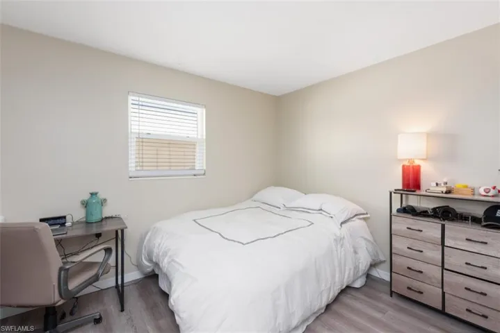 Bedroom with light wood-type flooring