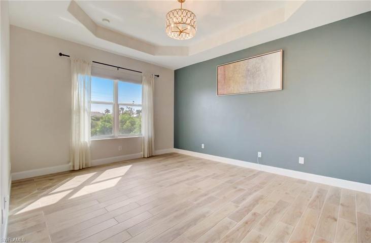 Master Bedroom, with tray Ceiling and Tile Floors