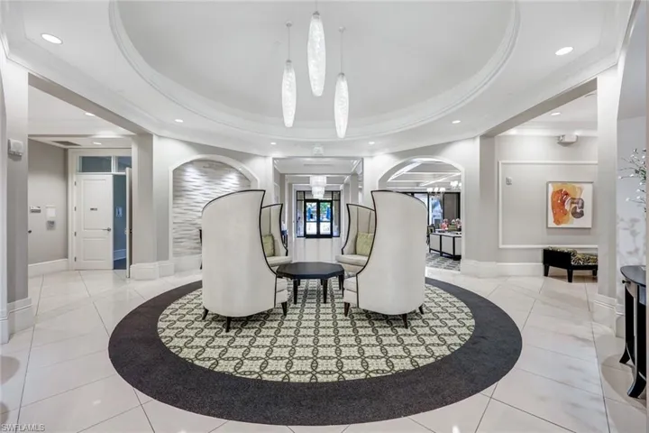 Common area featuring ornamental molding and recessed lighting