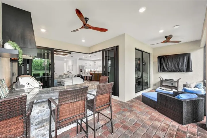 View of patio / terrace with an outdoor living space and a ceiling fan