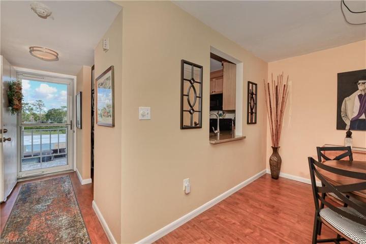 Entering the dining area, looking back toward the entry and kitchen.