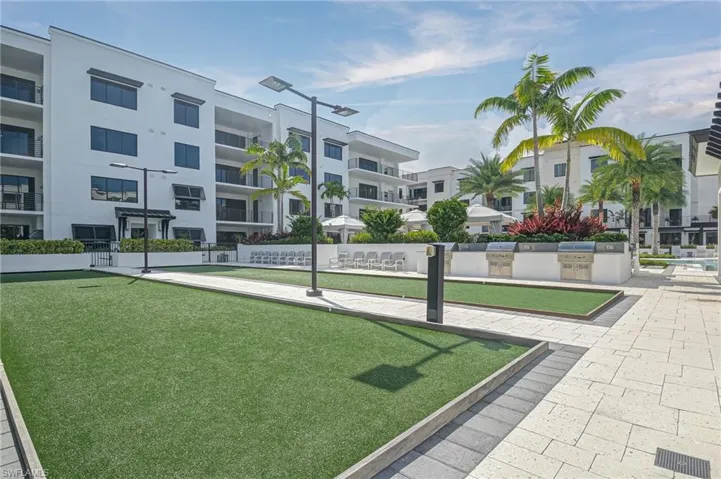 Bocce and grills near pool area