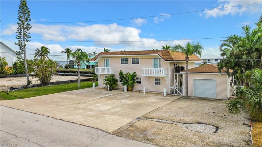 Triplex with detached garage