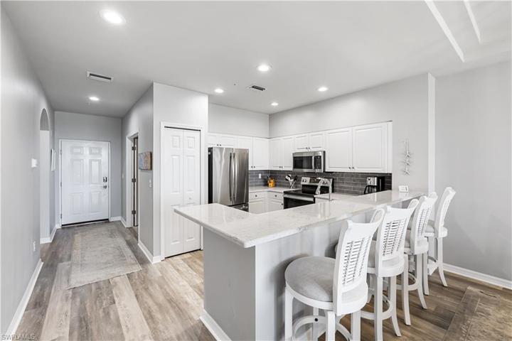 Quartz countertop w/ comfort height seating.