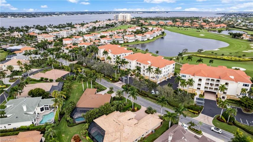 Welcome to Bellavista, Located in the Prestigious gated community of Gulf Harbour Yacht and Country Club! Eagle Eye Panoramic Views of the Lake and Golf Course! Community Pool & Spa and 2 Gas Grills.