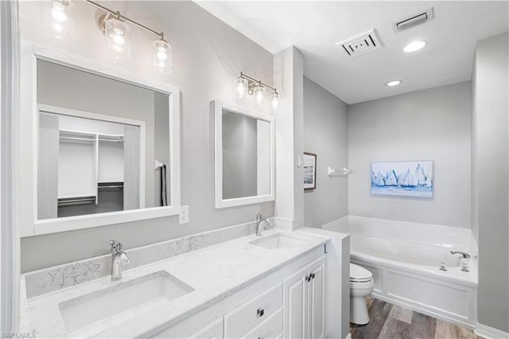 NEWLY UPGRADED Master Ensuite w/Quartz, Dual Vanity, Soaking Tub, Walk-In Shower and Custom Built Walk-In Closet.