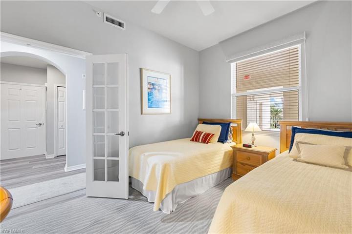 Den/Office is set up as a 3rd Bedroom w/Double French Doors, NEW CARPET, Twin Beds and Desk!