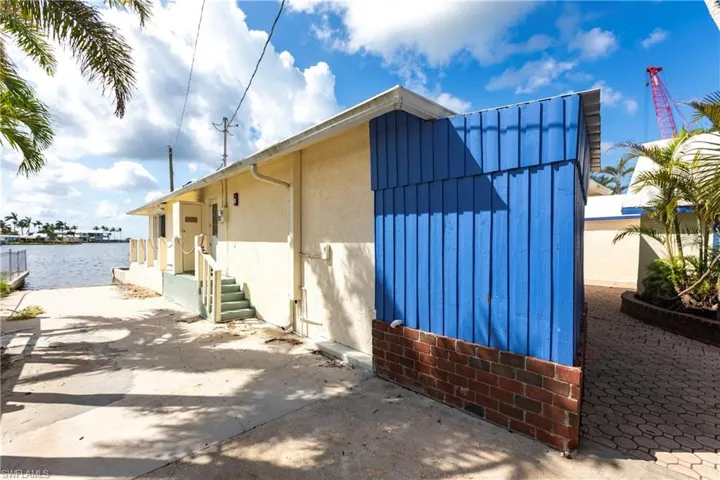 View of outbuilding featuring a water view
