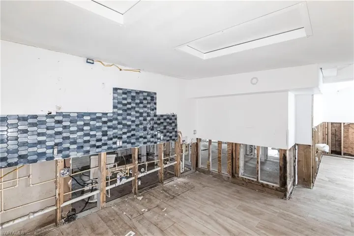 Misc room featuring wood finished floors