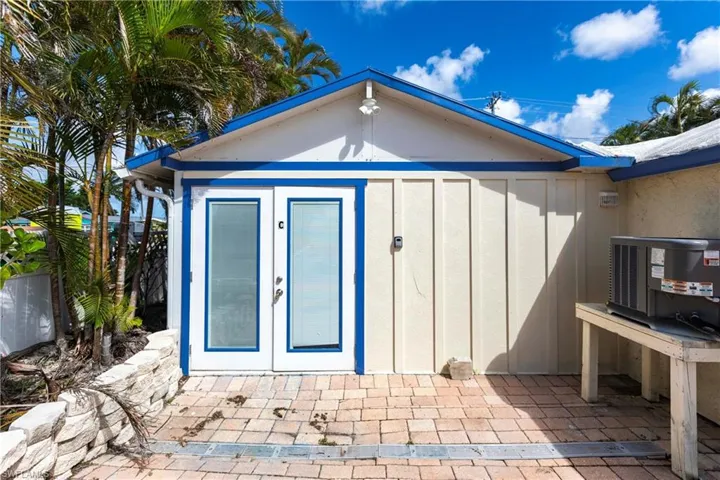View of outdoor structure featuring french doors