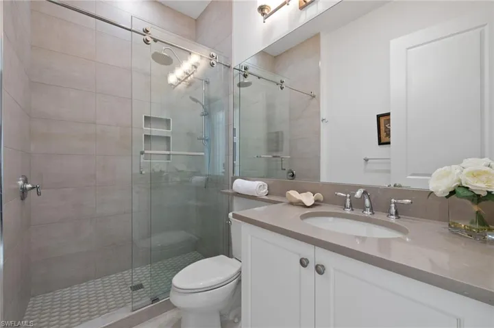 2nd full bathroom features a walk-in-shower and new fixtures (installed in late '23). Quite an upgrade from original tub featured n most Sierra models!