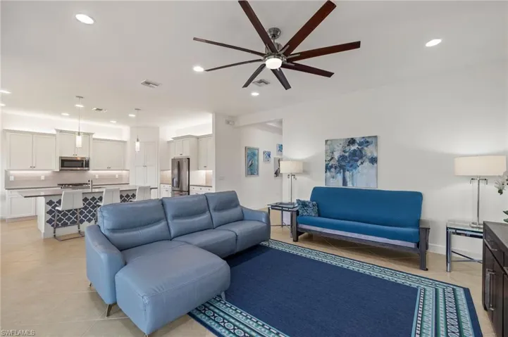 Light and bright great room off of kitchen for maximum entertaining utility!