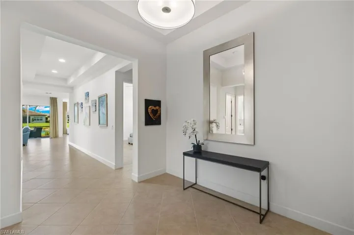Wait until you get a feel for this IMPRESSIVE front of home to rear of home hallway!