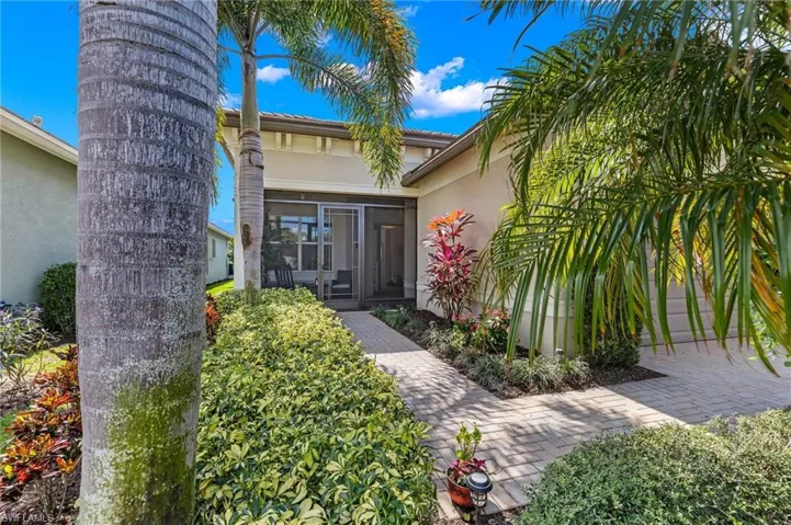 This screened front lanai area allows an AMAZING breeze when back sliders are opened!