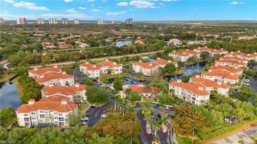 Bird's eye view of a large body of water and apartment complex