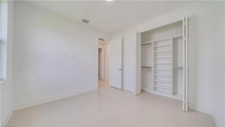 Front Guest Bedroom with custom closet system