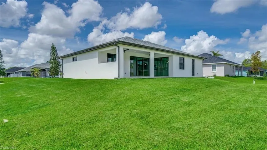 Large backyard. Room for a pool or whatever you want! Virtually enhanced.
