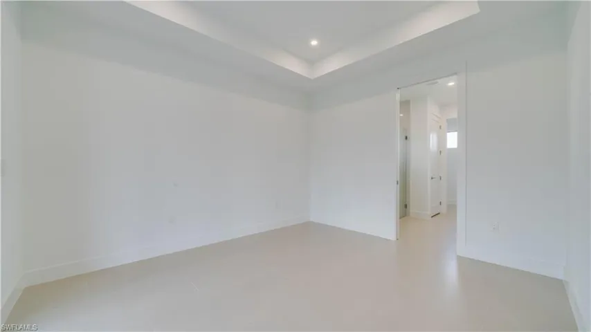 Primary bedroom showing access to ensuite.