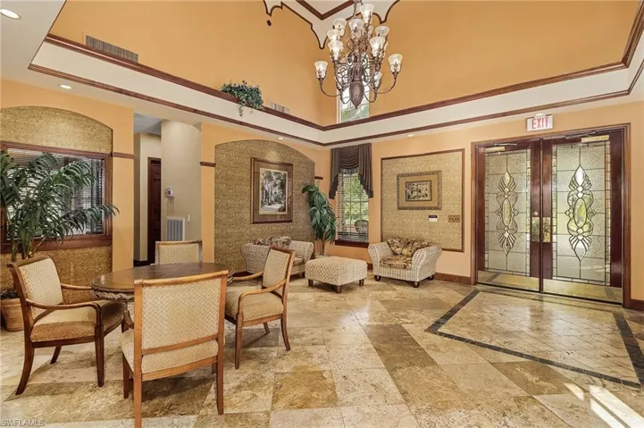 Common area featuring a high ceiling and recessed lighting