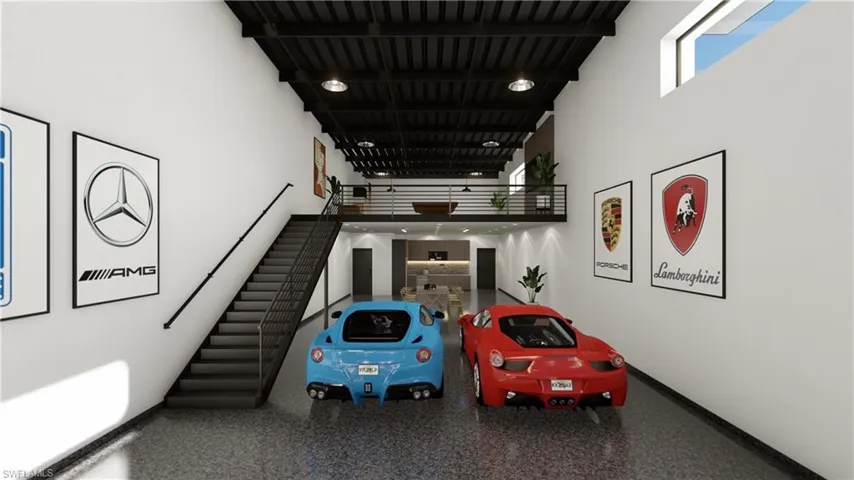 Garage featuring baseboards