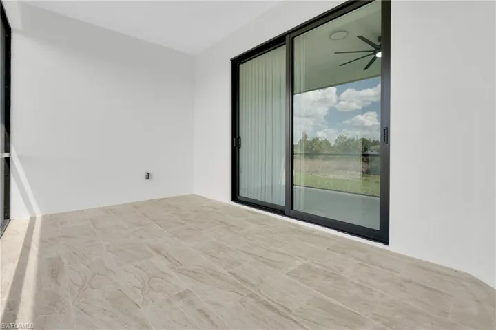 Empty room featuring ceiling fan