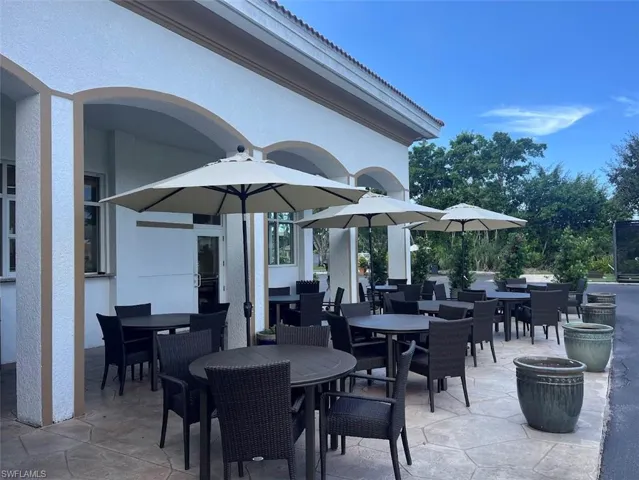View of patio featuring outdoor dining area