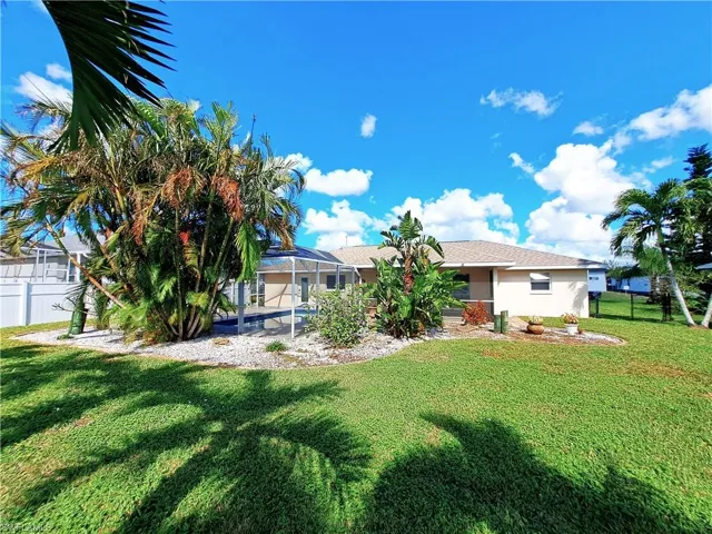 View of yard featuring a lanai