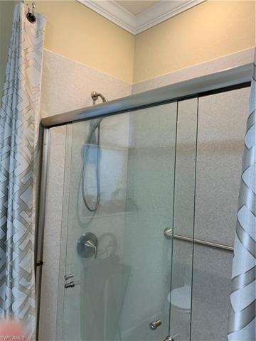 Guest bath has a new shower with glass door and tub removed