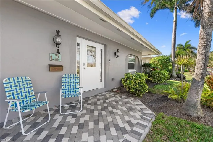Entrance to property with a patio