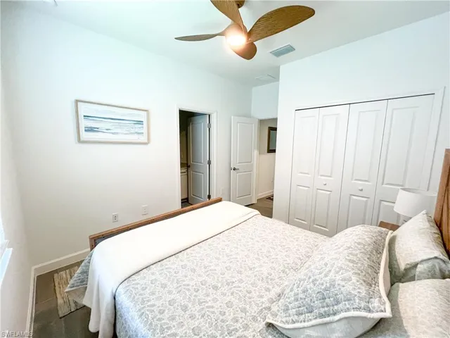 Bedroom with a closet and ceiling fan