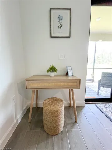 Detailed view of tile finished floors and baseboards