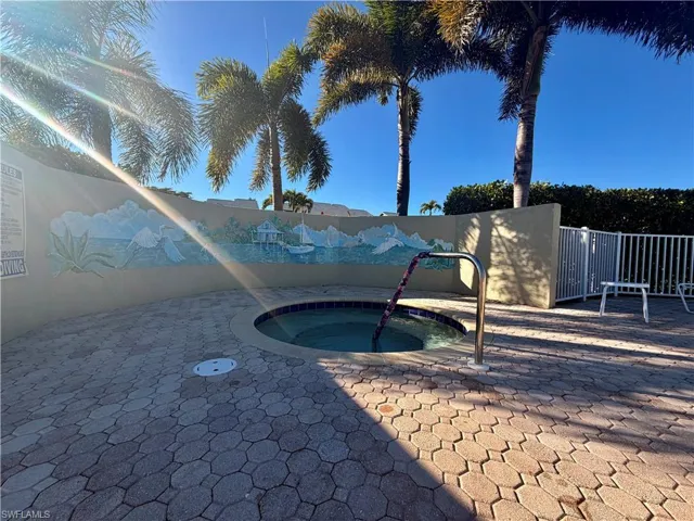 Community Pool featuring nook w/ Spa