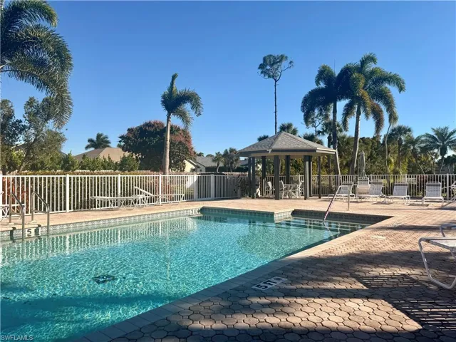 Community pool featuring cabana