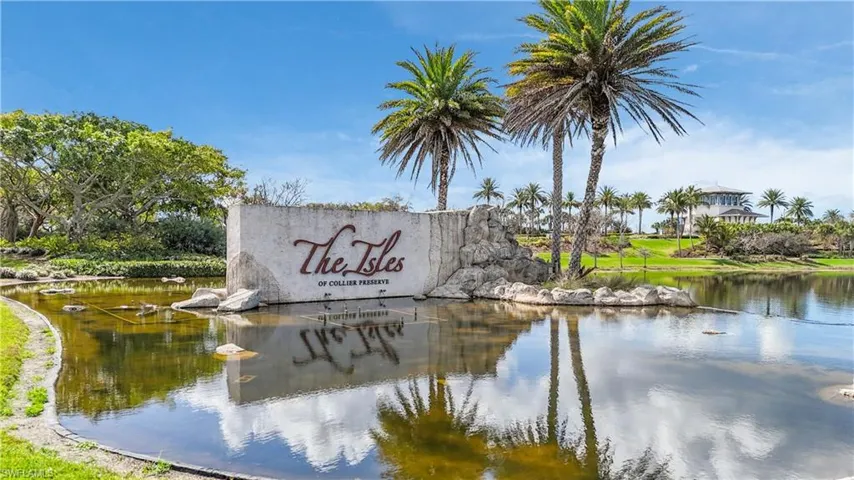 Community sign with a water view