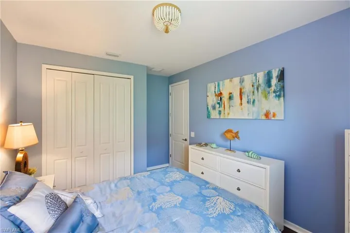 Bedroom featuring a closet and wood finished floors
