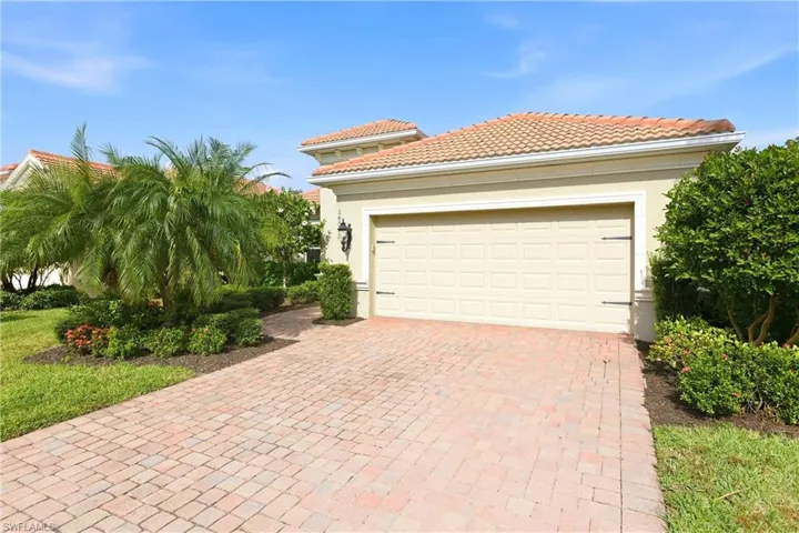 Garage with decorative driveway