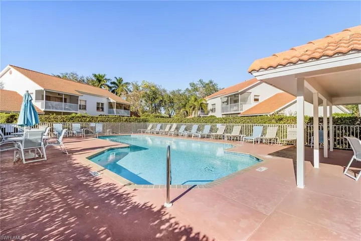 Community pool featuring a patio area