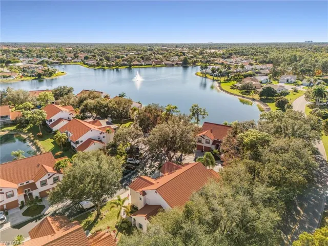 Aerial view of residential area with a nearby body of water