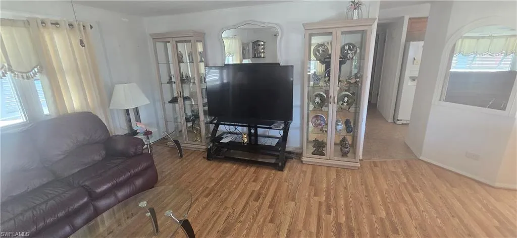 Living room with wood finished floors