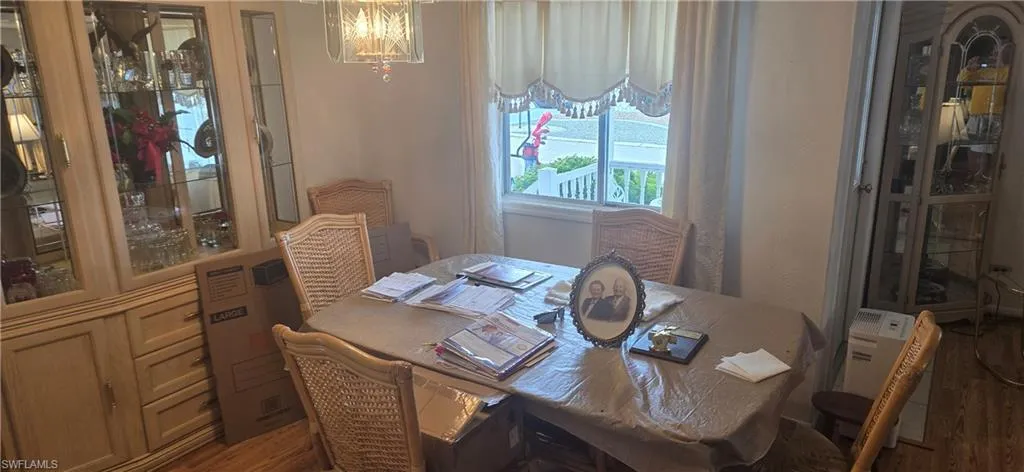 Dining room featuring wood finished floors