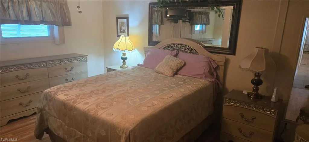 Bedroom featuring wood finished floors