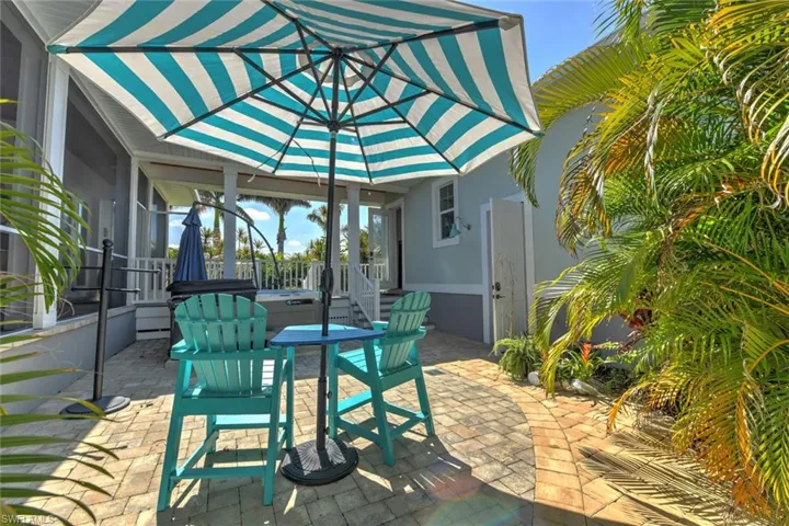 View of patio / terrace featuring a covered hot tub