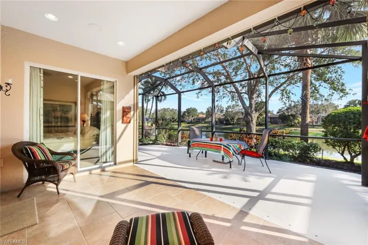 Sunroom with a water view