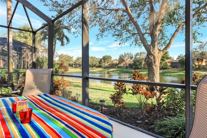 Sunroom with a water view