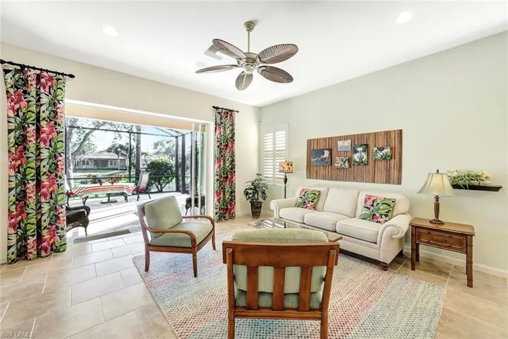 Tiled living room with ceiling fan