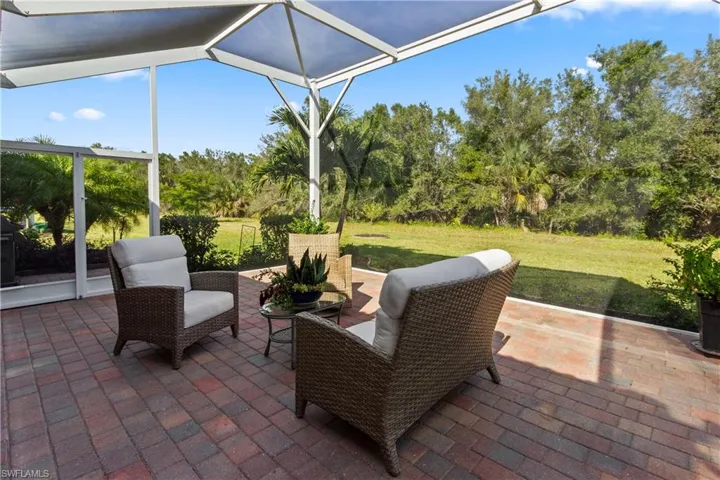 View of patio / terrace featuring a sunroom